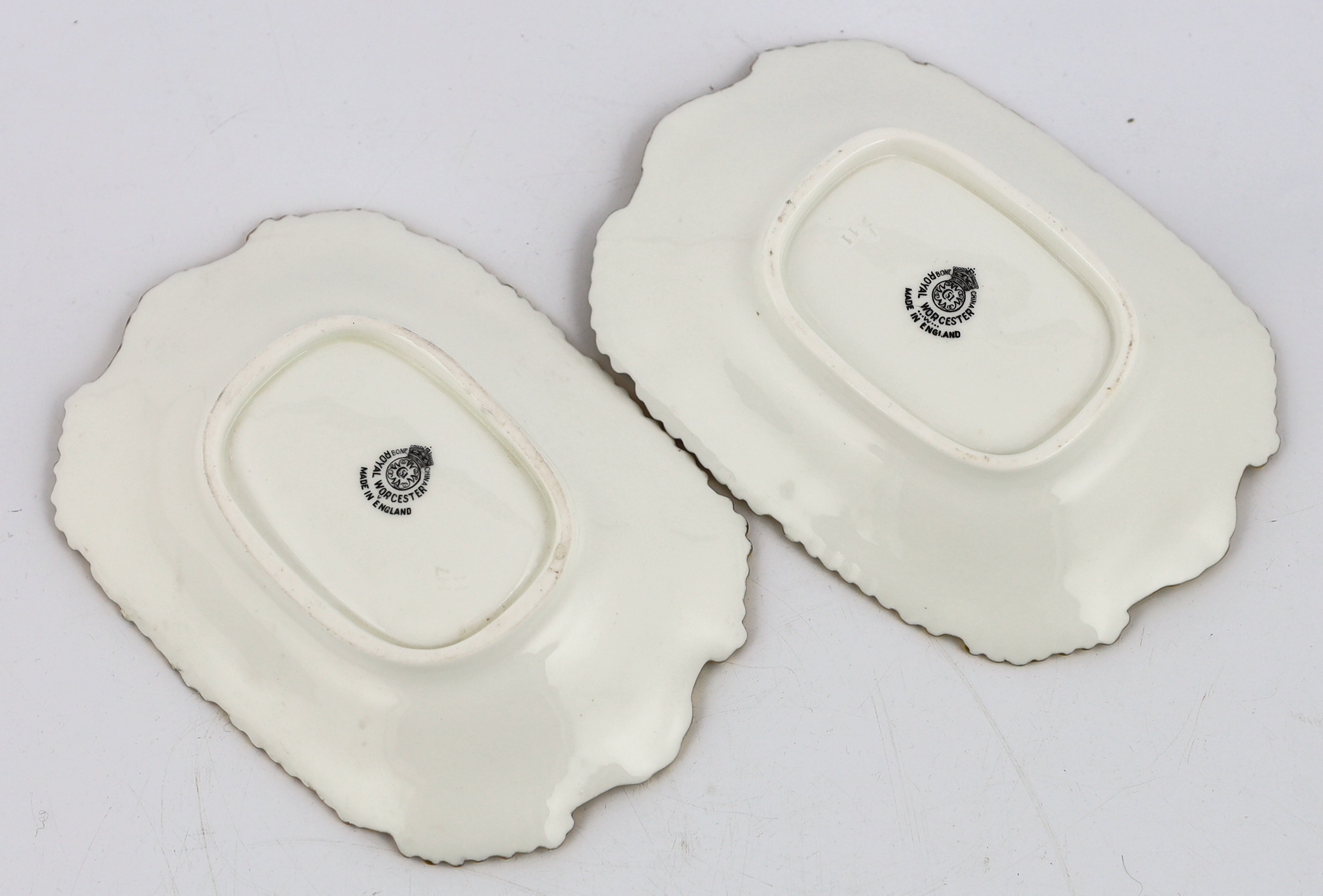 Two Royal Worcester fruit painted dishes, by T. Freeman, mid 20th century